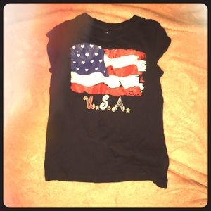 Black shirt with American decoration.